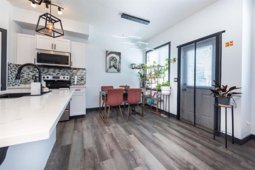 27 Sage Hill Common Nw, Calgary, AB - Indoor Photo Showing Kitchen With Upgraded Kitchen