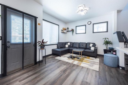 27 Sage Hill Common Nw, Calgary, AB - Indoor Photo Showing Living Room