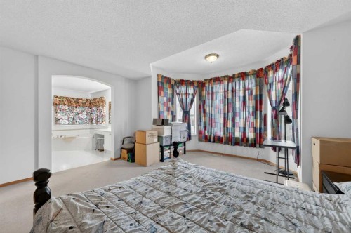 718 Coral Springs Boulevard Ne, Calgary, AB - Indoor Photo Showing Bedroom