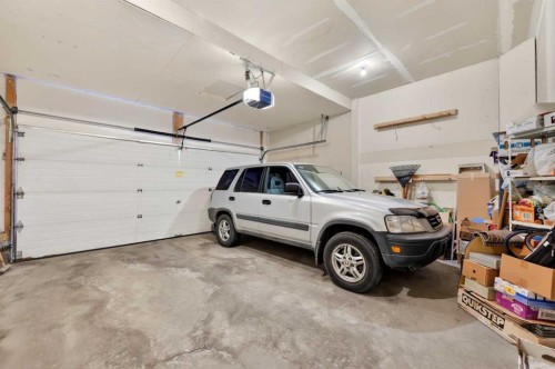 718 Coral Springs Boulevard Ne, Calgary, AB - Indoor Photo Showing Garage