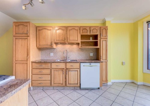 2514 16 Street Se, Calgary, AB - Indoor Photo Showing Kitchen With Double Sink