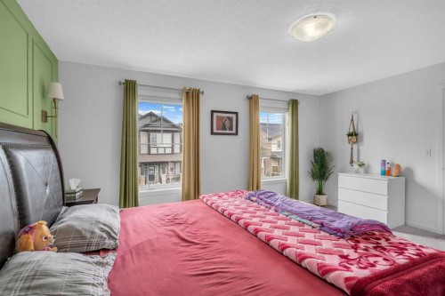 271 Carringham Road Nw, Calgary, AB - Indoor Photo Showing Bedroom