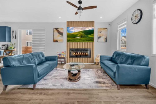 271 Carringham Road Nw, Calgary, AB - Indoor Photo Showing Living Room With Fireplace