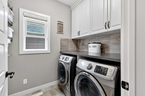 90 Cranbrook Hill Se, Calgary, AB - Indoor Photo Showing Laundry Room