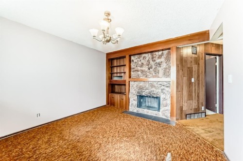 619 Maryvale Way Ne, Calgary, AB - Indoor With Fireplace