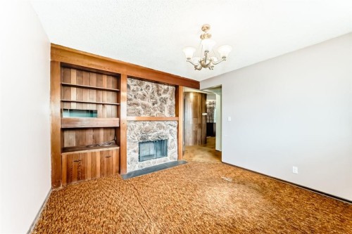 619 Maryvale Way Ne, Calgary, AB - Indoor With Fireplace
