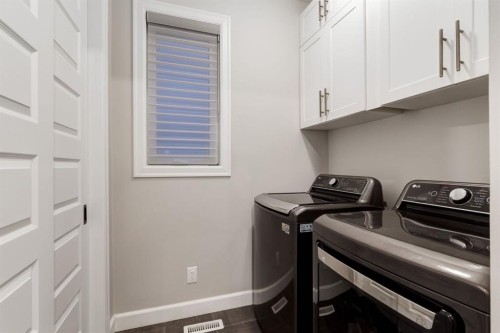 166 Osborne Common Sw, Airdrie, AB - Indoor Photo Showing Laundry Room