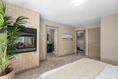 409 19 Avenue Ne, Calgary, AB - Indoor Photo Showing Bedroom With Fireplace