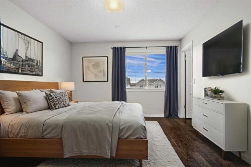 86 Elgin Meadows Gardens Se, Calgary, AB - Indoor Photo Showing Bedroom
