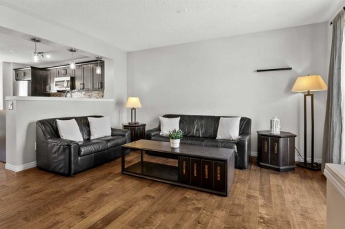 86 Elgin Meadows Gardens Se, Calgary, AB - Indoor Photo Showing Living Room