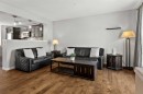 86 Elgin Meadows Gardens Se, Calgary, AB  - Indoor Photo Showing Living Room 