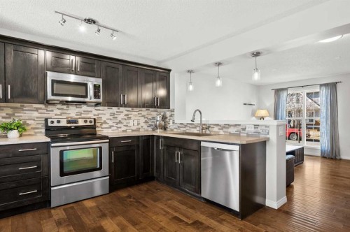 86 Elgin Meadows Gardens Se, Calgary, AB - Indoor Photo Showing Kitchen With Stainless Steel Kitchen With Upgraded Kitchen