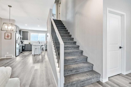 68 Wolf Gate, Okotoks, AB - Indoor Photo Showing Other Room