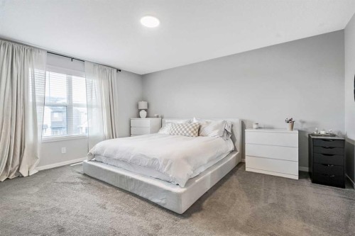 68 Wolf Gate, Okotoks, AB - Indoor Photo Showing Bedroom