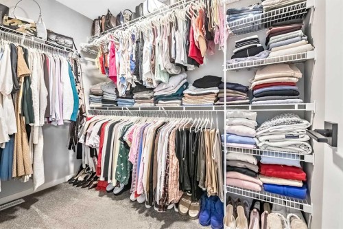 68 Wolf Gate, Okotoks, AB - Indoor With Storage