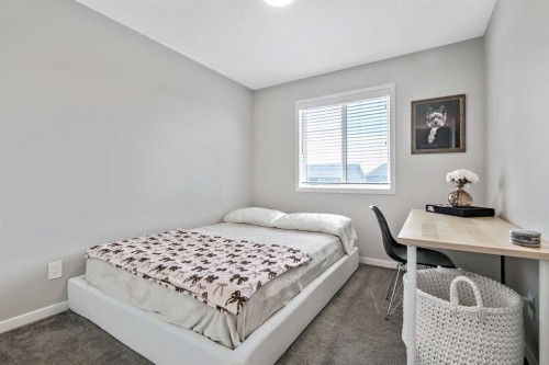 68 Wolf Gate, Okotoks, AB - Indoor Photo Showing Bedroom