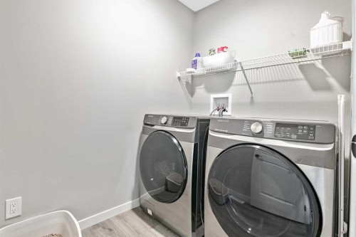 68 Wolf Gate, Okotoks, AB - Indoor Photo Showing Laundry Room