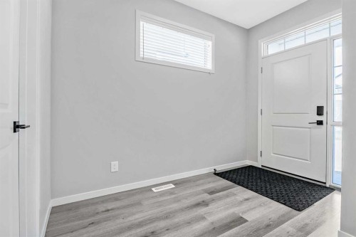 68 Wolf Gate, Okotoks, AB - Indoor Photo Showing Other Room