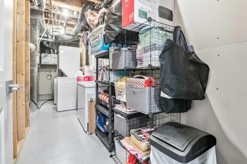 68 Wolf Gate, Okotoks, AB - Indoor Photo Showing Laundry Room