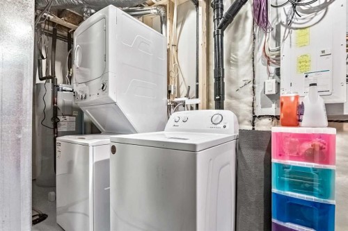 68 Wolf Gate, Okotoks, AB - Indoor Photo Showing Laundry Room