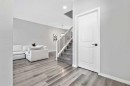 68 Wolf Gate, Okotoks, AB  - Indoor Photo Showing Other Room 