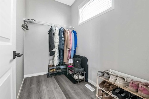 68 Wolf Gate, Okotoks, AB - Indoor With Storage