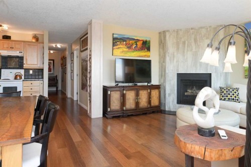 303-524 Cedar Crescent Sw, Calgary, AB - Indoor With Fireplace
