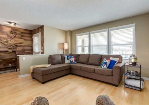 165 Walden Manor Se, Calgary, AB - Indoor Photo Showing Living Room