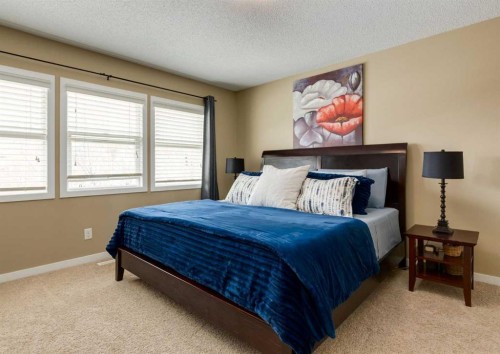 165 Walden Manor Se, Calgary, AB - Indoor Photo Showing Bedroom