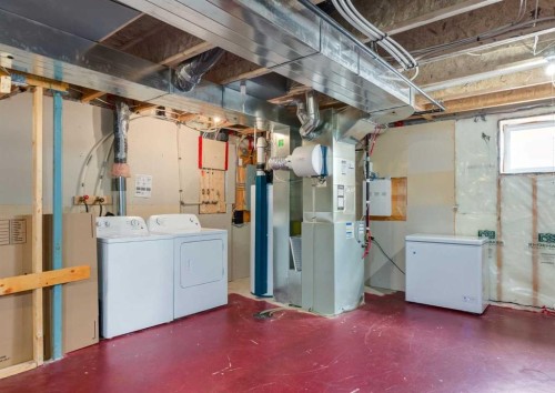 165 Walden Manor Se, Calgary, AB - Indoor Photo Showing Laundry Room