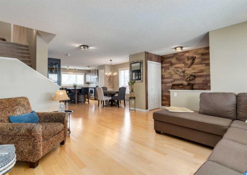 165 Walden Manor Se, Calgary, AB - Indoor Photo Showing Living Room