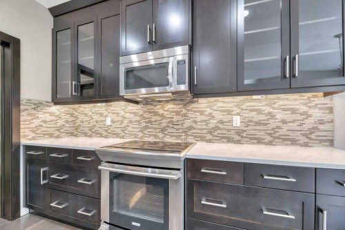 29 Aspen Summit Point Sw, Calgary, AB - Indoor Photo Showing Kitchen With Upgraded Kitchen