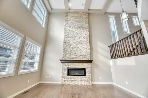 29 Aspen Summit Point Sw, Calgary, AB - Indoor Photo Showing Other Room With Fireplace