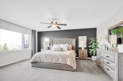 142 Fireside Bend, Cochrane, AB - Indoor Photo Showing Bedroom