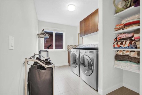 142 Fireside Bend, Cochrane, AB - Indoor Photo Showing Laundry Room