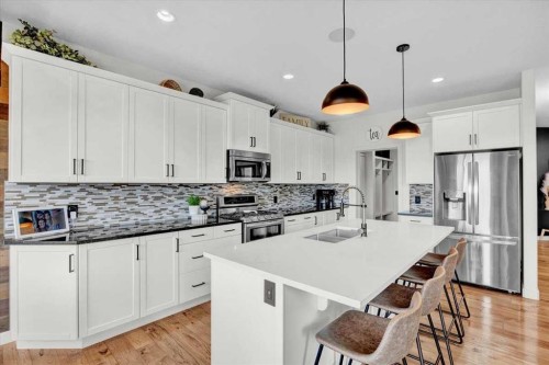142 Fireside Bend, Cochrane, AB - Indoor Photo Showing Kitchen With Upgraded Kitchen