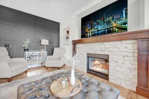 142 Fireside Bend, Cochrane, AB - Indoor Photo Showing Living Room With Fireplace