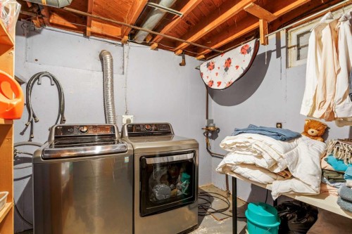 5 Fraser Road Se, Calgary, AB - Indoor Photo Showing Laundry Room