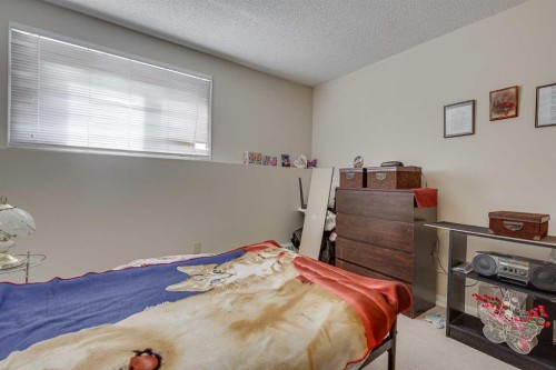 103-41 Bennett Street, Red Deer, AB - Indoor Photo Showing Bedroom