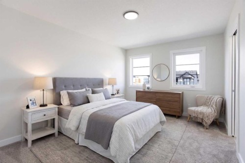 313 Cobblestone Gate Sw, Airdrie, AB - Indoor Photo Showing Bedroom