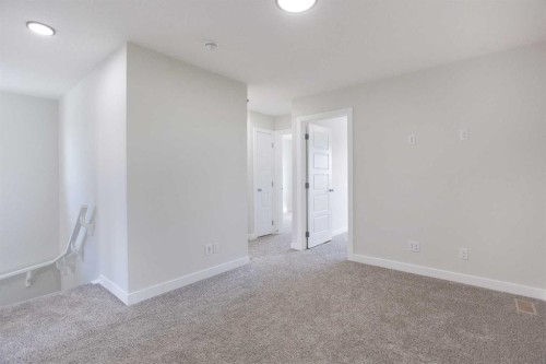 313 Cobblestone Gate Sw, Airdrie, AB - Indoor Photo Showing Other Room