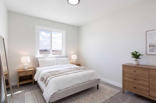 313 Cobblestone Gate Sw, Airdrie, AB - Indoor Photo Showing Bedroom