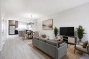 313 Cobblestone Gate Sw, Airdrie, AB  - Indoor Photo Showing Living Room 