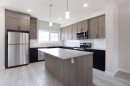 313 Cobblestone Gate Sw, Airdrie, AB  - Indoor Photo Showing Kitchen With Stainless Steel Kitchen With Upgraded Kitchen 