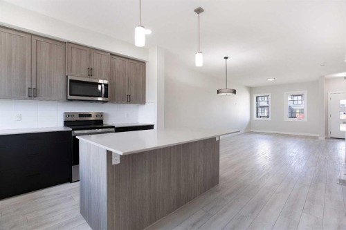 313 Cobblestone Gate Sw, Airdrie, AB - Indoor Photo Showing Kitchen