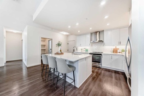 307-12 Mahogany Path Se, Calgary, AB - Indoor Photo Showing Kitchen With Stainless Steel Kitchen With Upgraded Kitchen