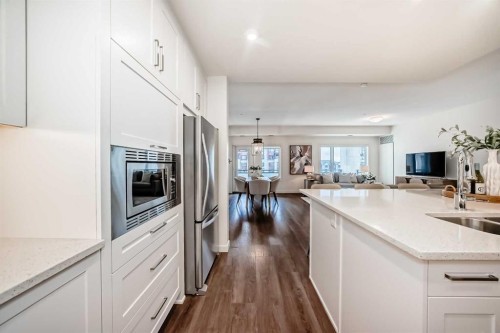 307-12 Mahogany Path Se, Calgary, AB - Indoor Photo Showing Kitchen