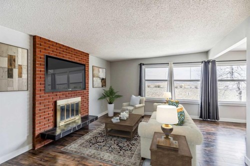 5636 37 Street Sw, Calgary, AB - Indoor Photo Showing Living Room With Fireplace