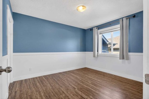 811 Boulder Creek Drive Se, Langdon, AB - Indoor Photo Showing Other Room