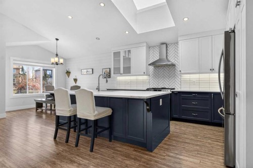 811 Boulder Creek Drive Se, Langdon, AB - Indoor Photo Showing Kitchen With Upgraded Kitchen